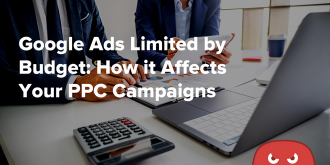 Image of two people working on PPC Campaigns
